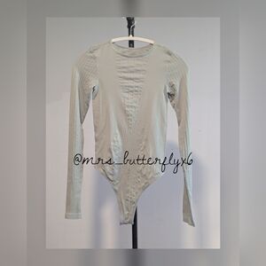 Free People Seams To Me Seamless Bodysuit in Heather Grey